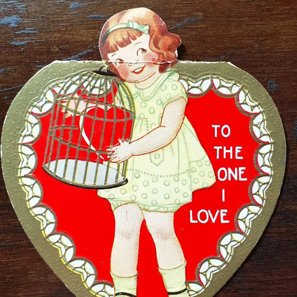 1940's Die Cut HEART SHAPE GIRL HOLDING CAGE Valentine's Day Card